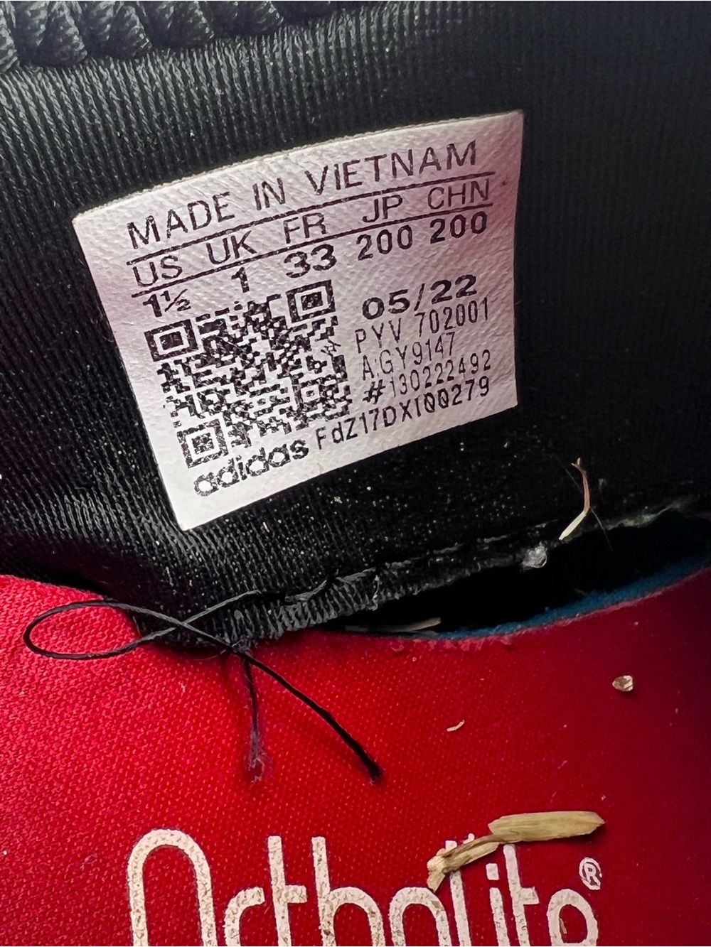 adidas NMB Kids Black Slip-On Sneakers with Blue & Red Midsole Accent - Picture 8 of 9